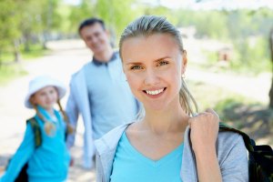Photo of smiling new dental patient and family