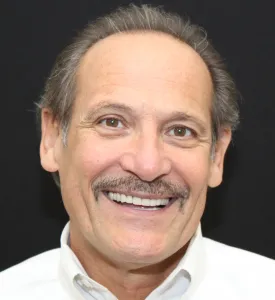 After Photo: Metal-free dental implant crowns, patient of Dr Laudati, Cosmetic Dentist in St James NY